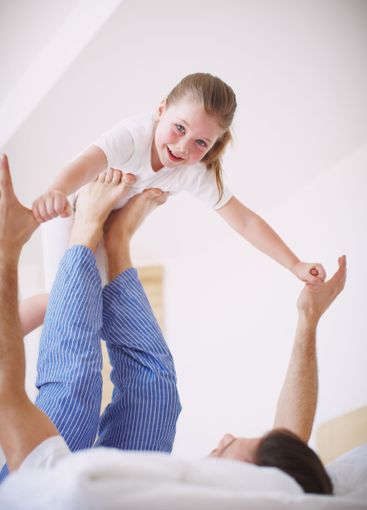 Father, kid and airplane games in home, morning fun and...