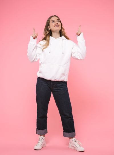 Full length image of Smiling woman wearing in casual...