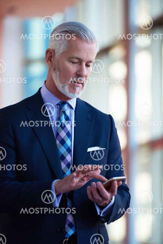 senior business man talk on mobile phone
