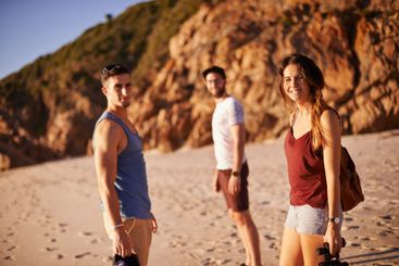 Smile, people and portrait on beach outdoor for travel...