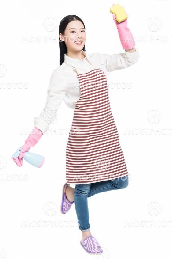 young woman cleaning on white