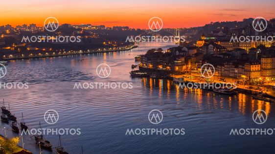 Night view of the Douro river and Ribeiro in Porto,...