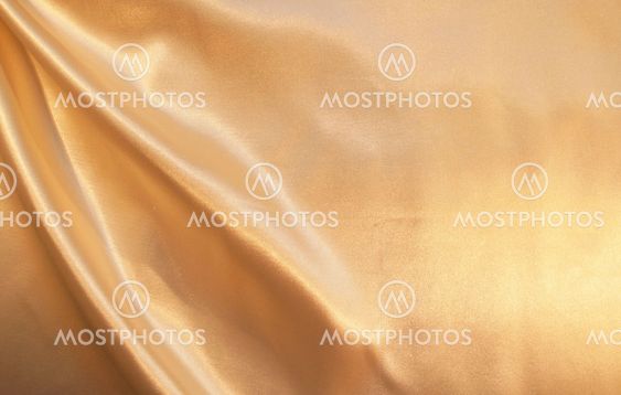 Smooth elegant golden silk as background