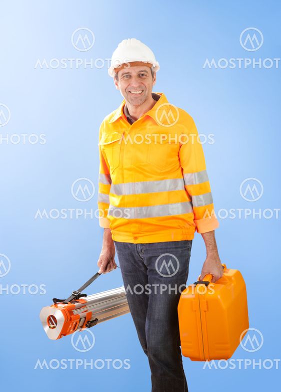 Senior land surveyor with theodolite equipment