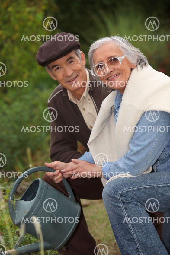 elderly couple gardening