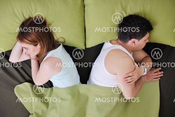 young couple in bed