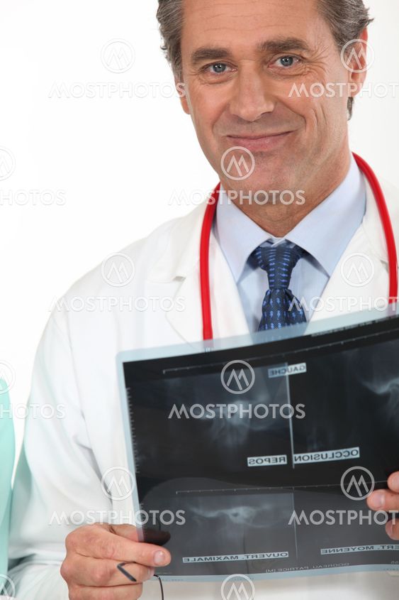 Doctor holding x-ray image