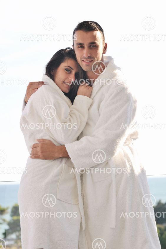 couple relaxing on balcony