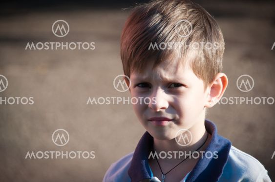 Portrait of the boy with a sad look
