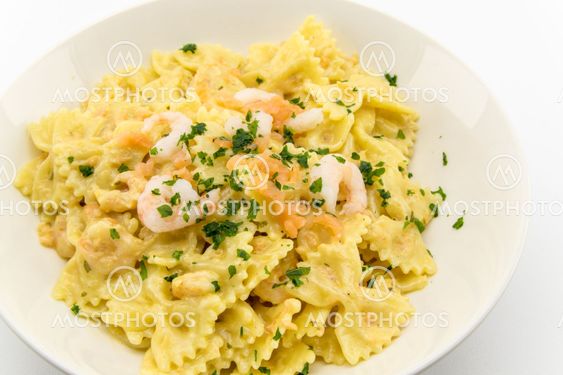 italian pasta called butterflies with shrimp salmon and...