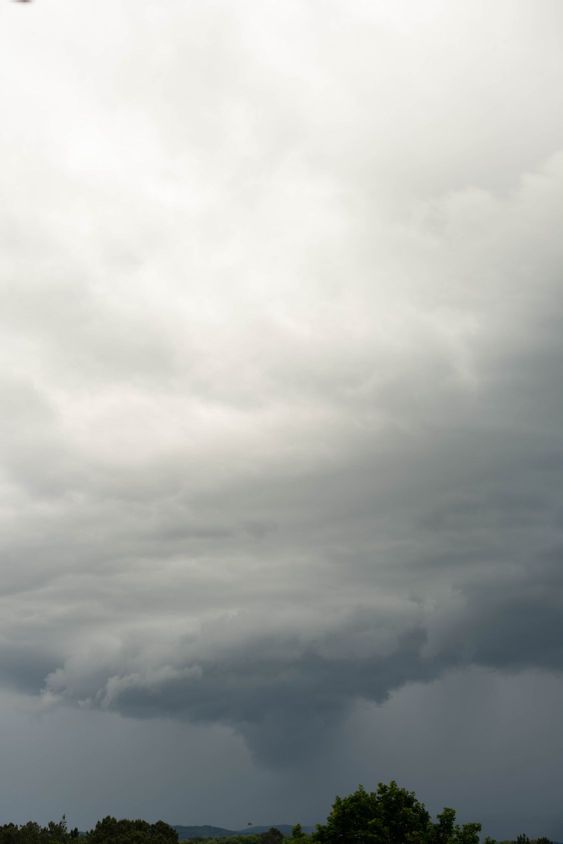 gigantic storm cloud formation in the gray sky