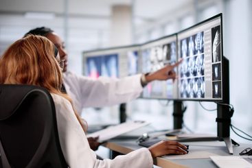 Medical Professionals Analyzing MRI Scan