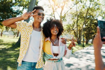 Fashion, happy or couple in park for photograph together...