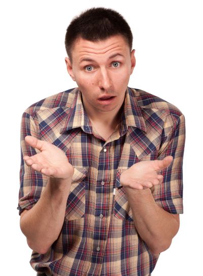 Bewildered man in plaid shirt