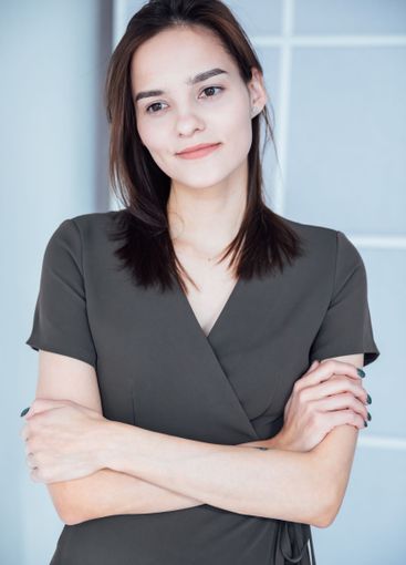 Beautiful Slim Woman in Green Summer Dress on White...