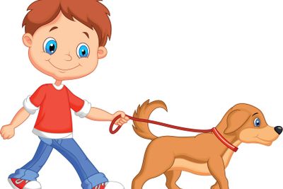 Cute boy walking with dog