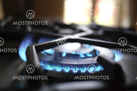 blue flame of gas in kitchen