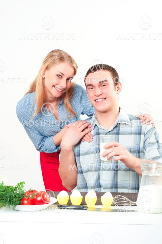 wife gives her husband a meal
