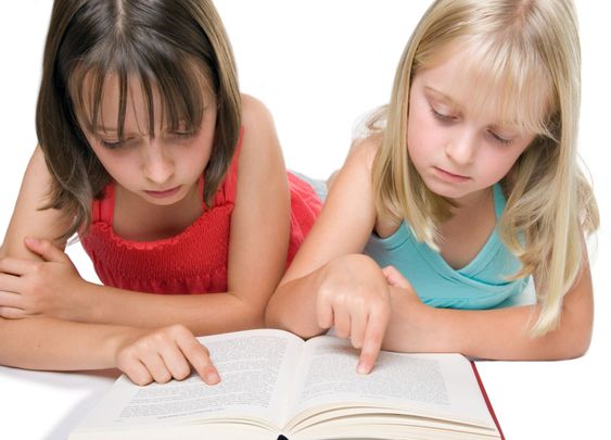 Two sisters reading