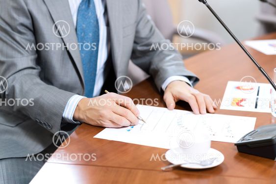 businessman taking notes