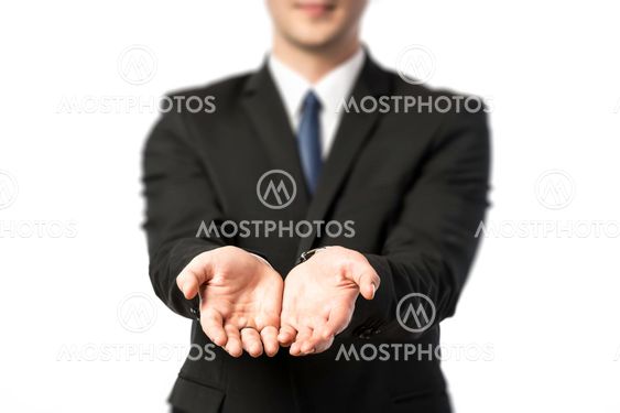 Businessman stretching out both hands