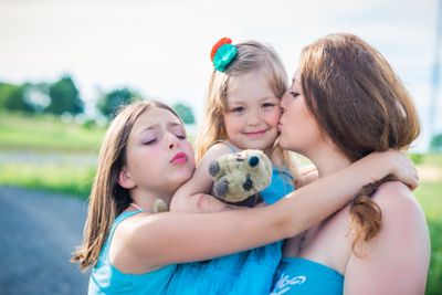 portrait of mother and two daughters