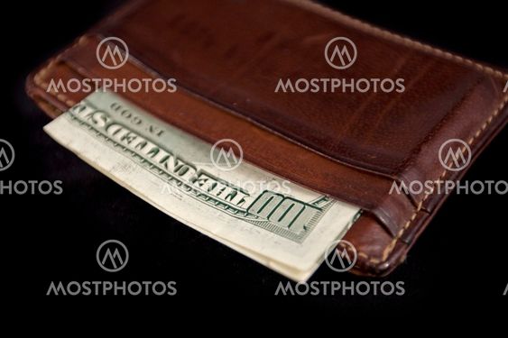 wallet with hundred dollars