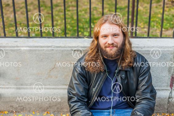 Blond Beard Young Adult Hipster Man Listening Music