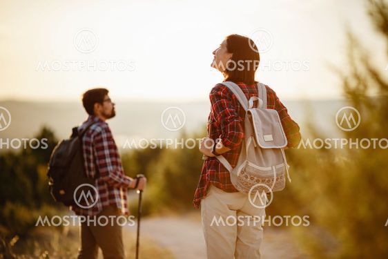 Portrait of happy young couple having fun on their...