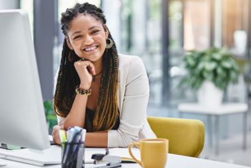 Portrait, happy secretary and businesswoman in creative...