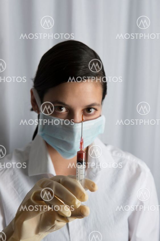 Beautiful women holding syringe