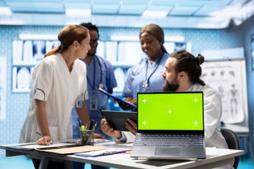 Licensed doctor and staff review x ray scan results next...