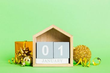 1 january. Christmas composition on colored background...