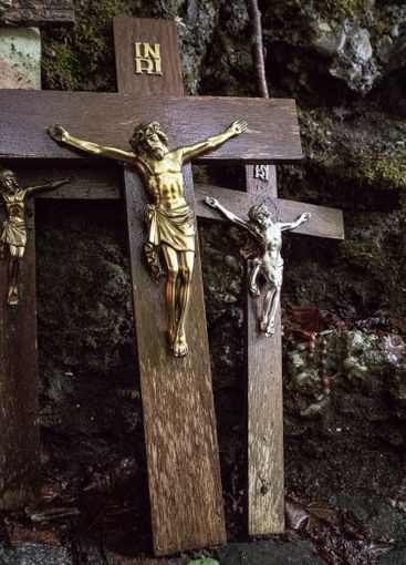 Religious and Christian objects and candles on the...