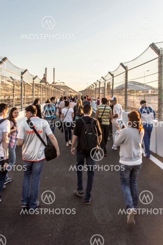 The exit from the pit line. Fans.