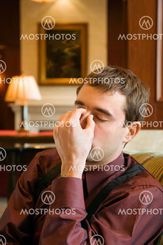 Businessman with headache.