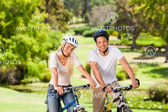Couple in the park with their bikes