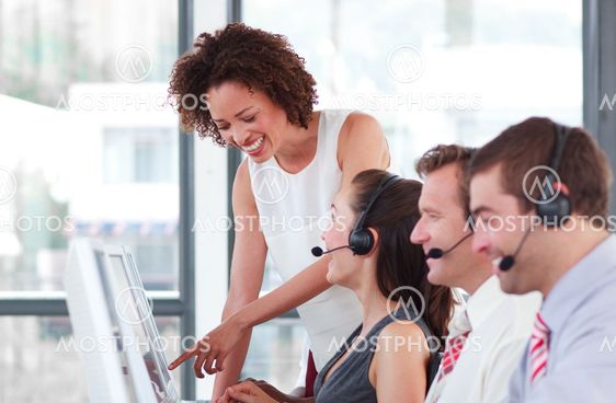 Jolly female manager with her sale representative team
