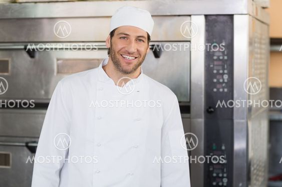 Smiling baker looking at camera