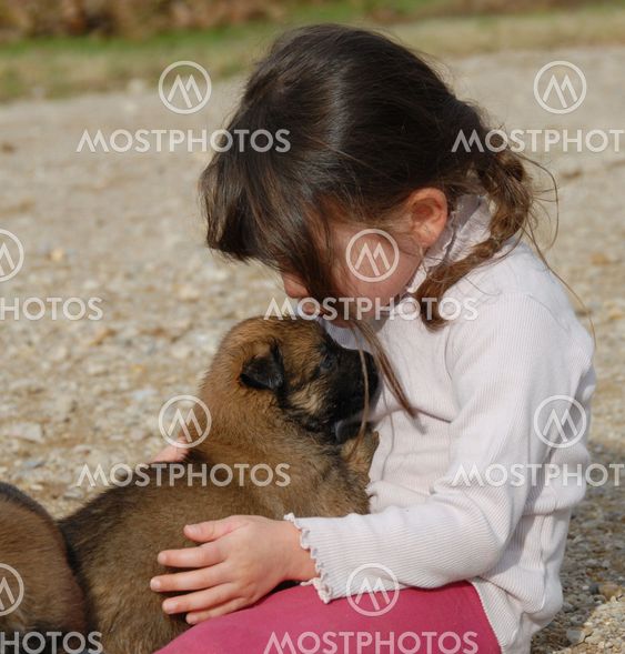 girl and little dog