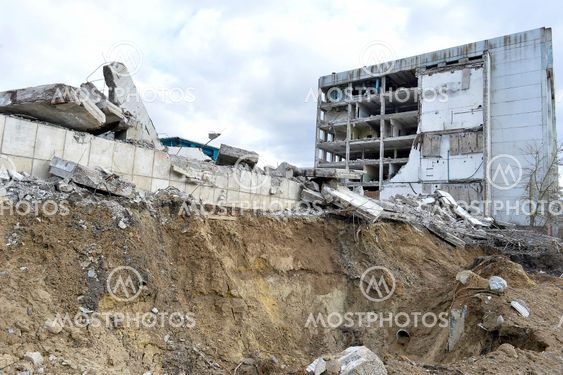 Pieces of Metal and Stone are Crumbling from Demolished Building Floors