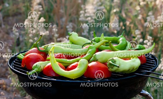 Tomato and Peppers Fish Grilling On BBQ