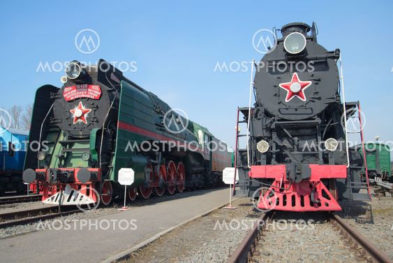 Two old Soviet locomotive P36 and LV18 in the October...