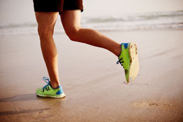 Man, sand and legs running in nature for fitness,...