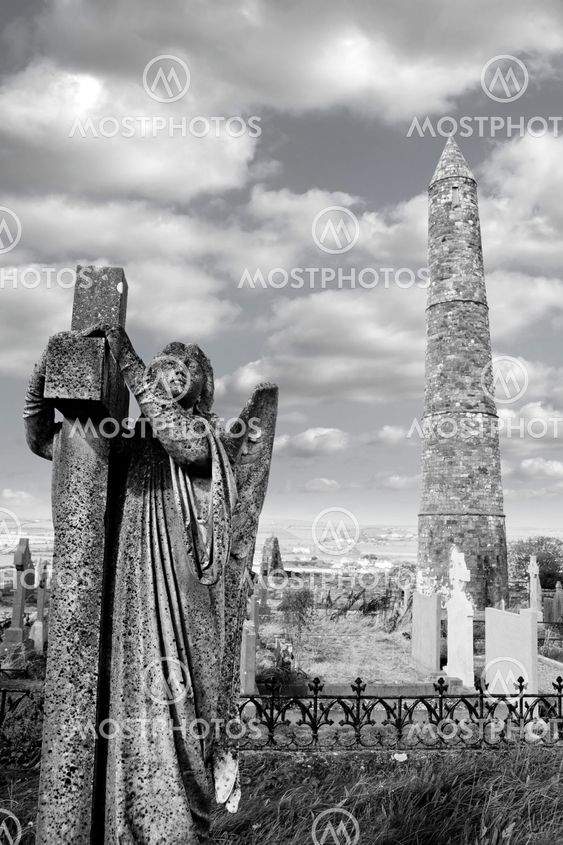 Archangel gravestone and Ancient round tower