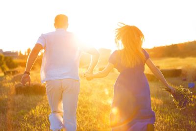 Silhouette of couple on sunset