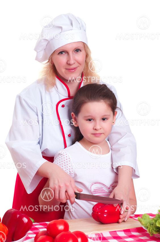 Mother and daughter cooking dinner