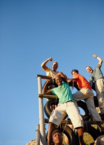 Fitness, celebration and team of men at bootcamp in...