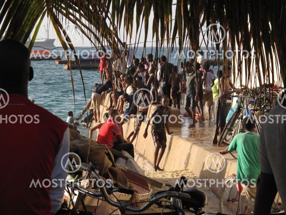 Bathing and playing at Zanzibar beach/port