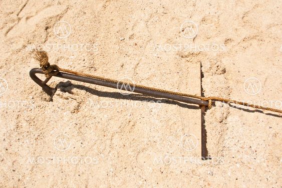 Old rusty anchor.